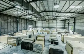 L'application de la Ligne de production de film étirable entièrement automatique dans les matériaux de construction lourds et la transformation de la pierre
