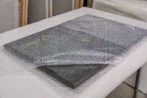 氣泡布整廠設備:半成品漆板防塵收納之應用