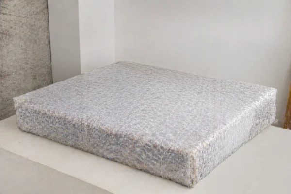 Linha de produção de plástico bolha: Proteção de armazenamento para painéis de madeira lacada